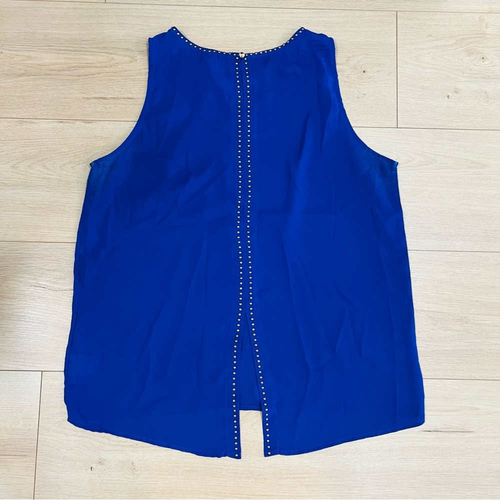 Renee C. Vibrant Blue Sleeveless Blouse with Gold Metal detail